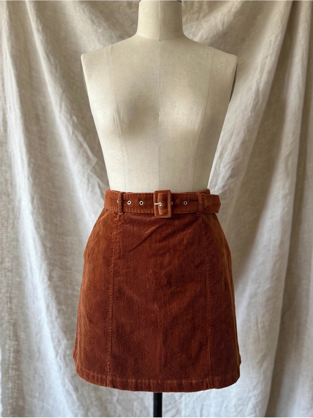 ELOQUII Elements rust / burnt orange corduroy belted mini skirt measures as a 14